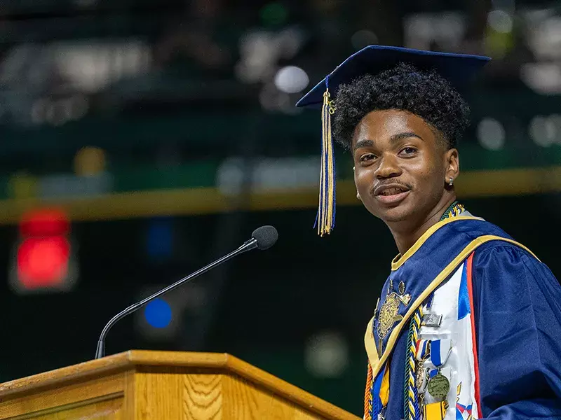 Member of the C.D. Hylton High School class of 2026 speaking at graduation