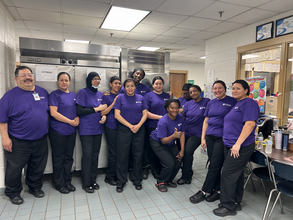 The best cafeteria staff celebrating Purple Up! Day